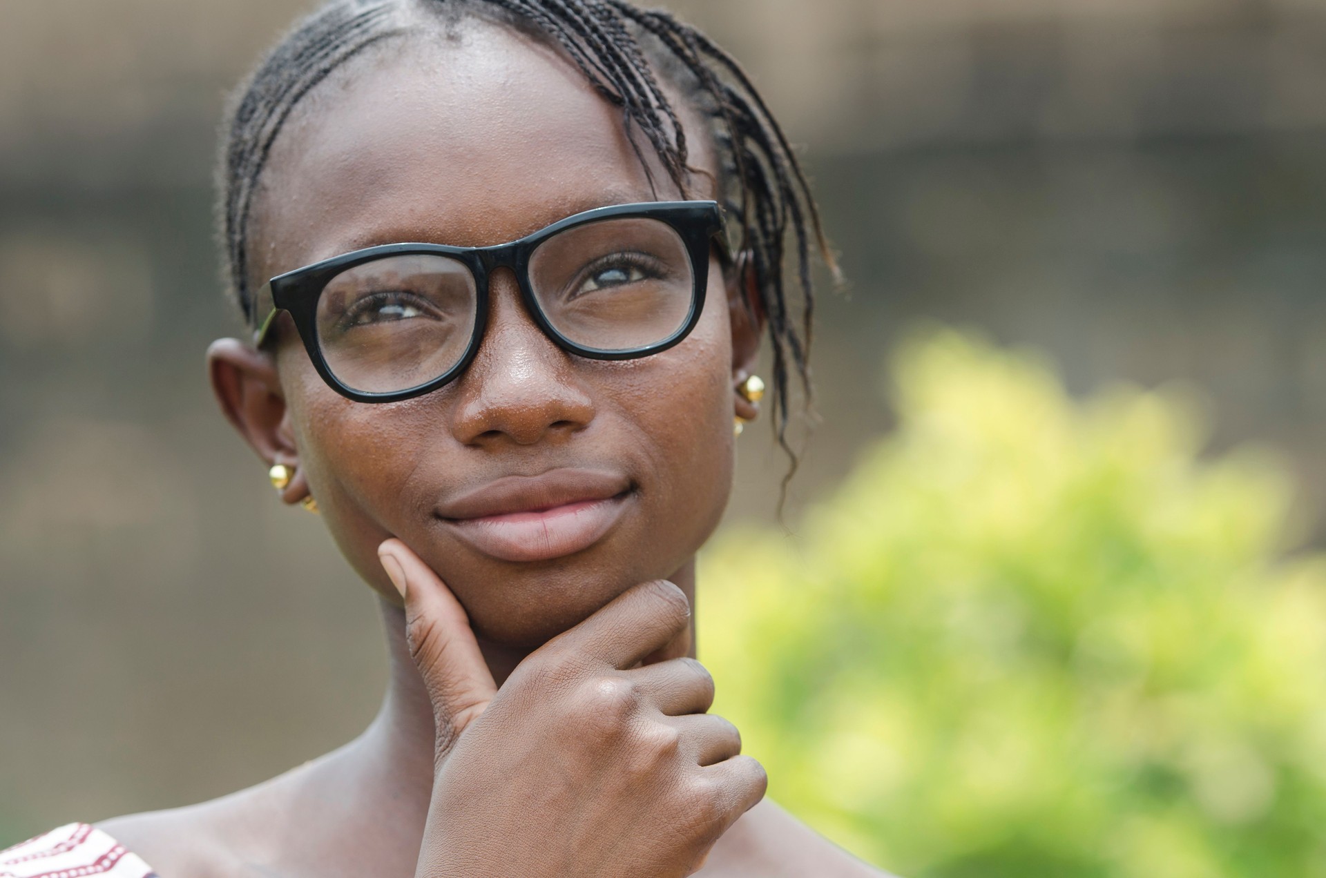 Africa's Future - Teenage Schoolgirl thinking about her future on the African continent
